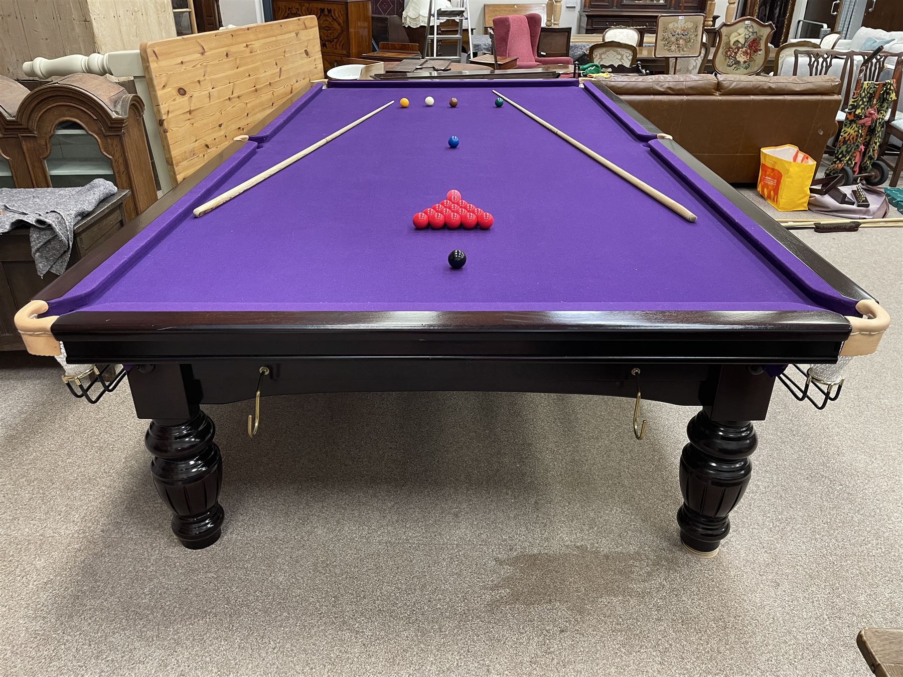 Riley - full-sized 12' x 6' slate bed snooker table, mahogany frame with purple baize, raised on turned and fluted baluster supports, recently refurbished; together with, cues, scoreboard, cover, snooker and pool balls