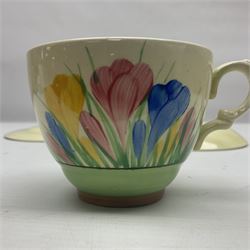 Clarice Cliff trio and plate in Spring Crocus pattern, all with printed mark beneath, plate D25cm 