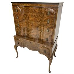 Early to mid-20th century figured walnut chest on stand, four graduating drawers on stand fitted with single drawer, drop handles in the form of shields with three recumbent lions, on cabriole supports