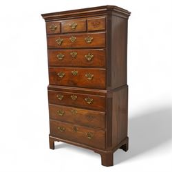 George III mahogany canted chest-on-chest, moulded cornice over three short and six long moulded drawers, shaped and pierced handle plates with swan neck handles, fluted upright canted corners, on bracket feet 