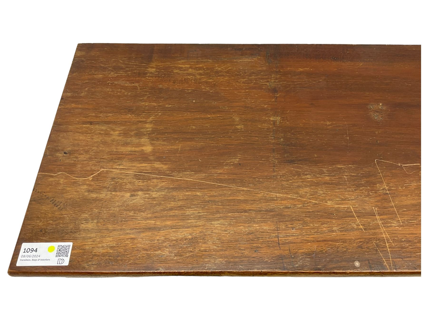 Early 20th century mahogany bookcase, rectangular top over two glazed doors, fitted with four adjustable shelves, on turned bun feet 