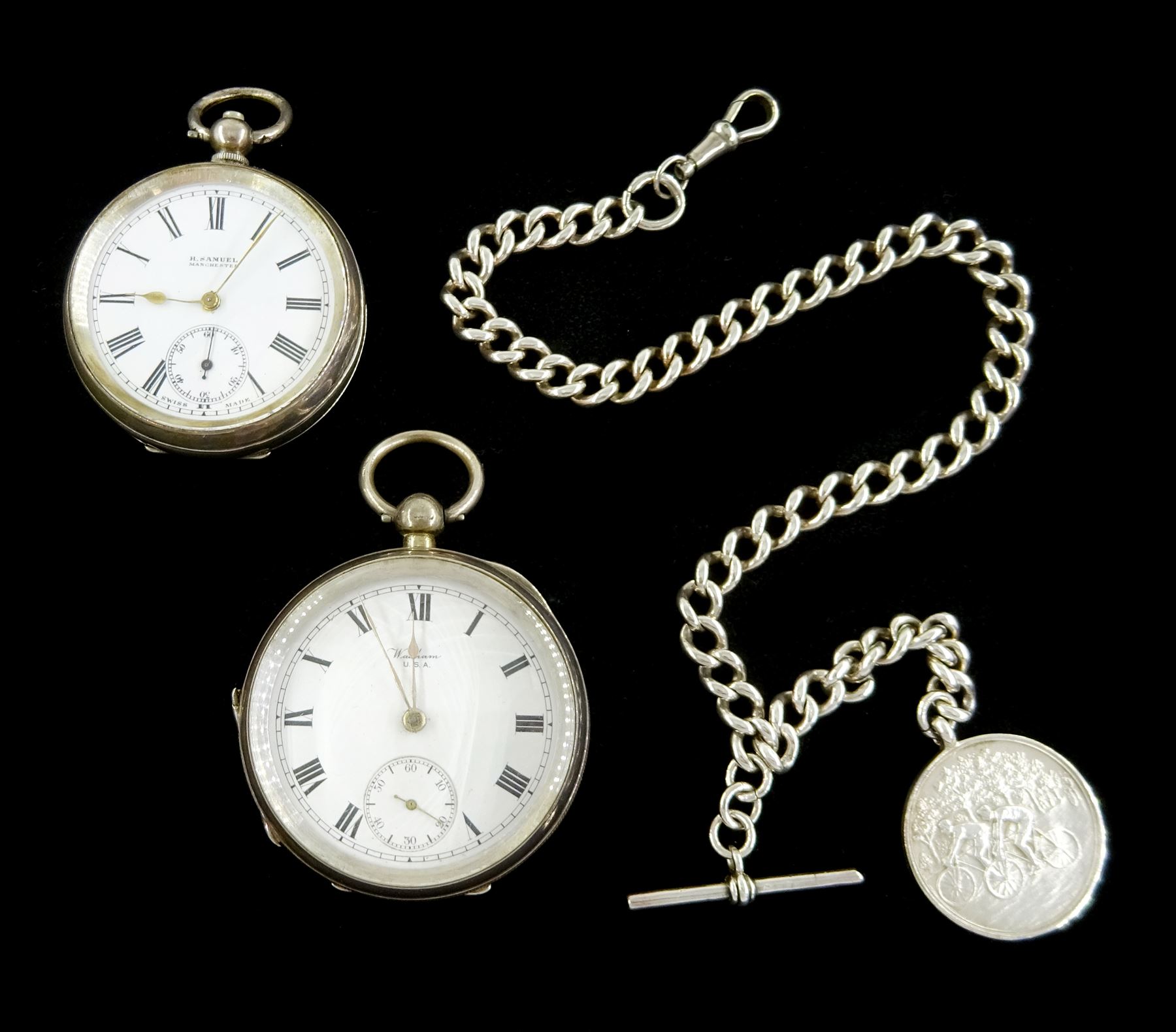 Two silver open face key wound lever pocket watches, one by American Watch Company,  case by Dennison, the other by H.Samuel, white enamel dials with Roman numerals and subsidiary seconds dial and a silver Albert chain with silver cycling fob