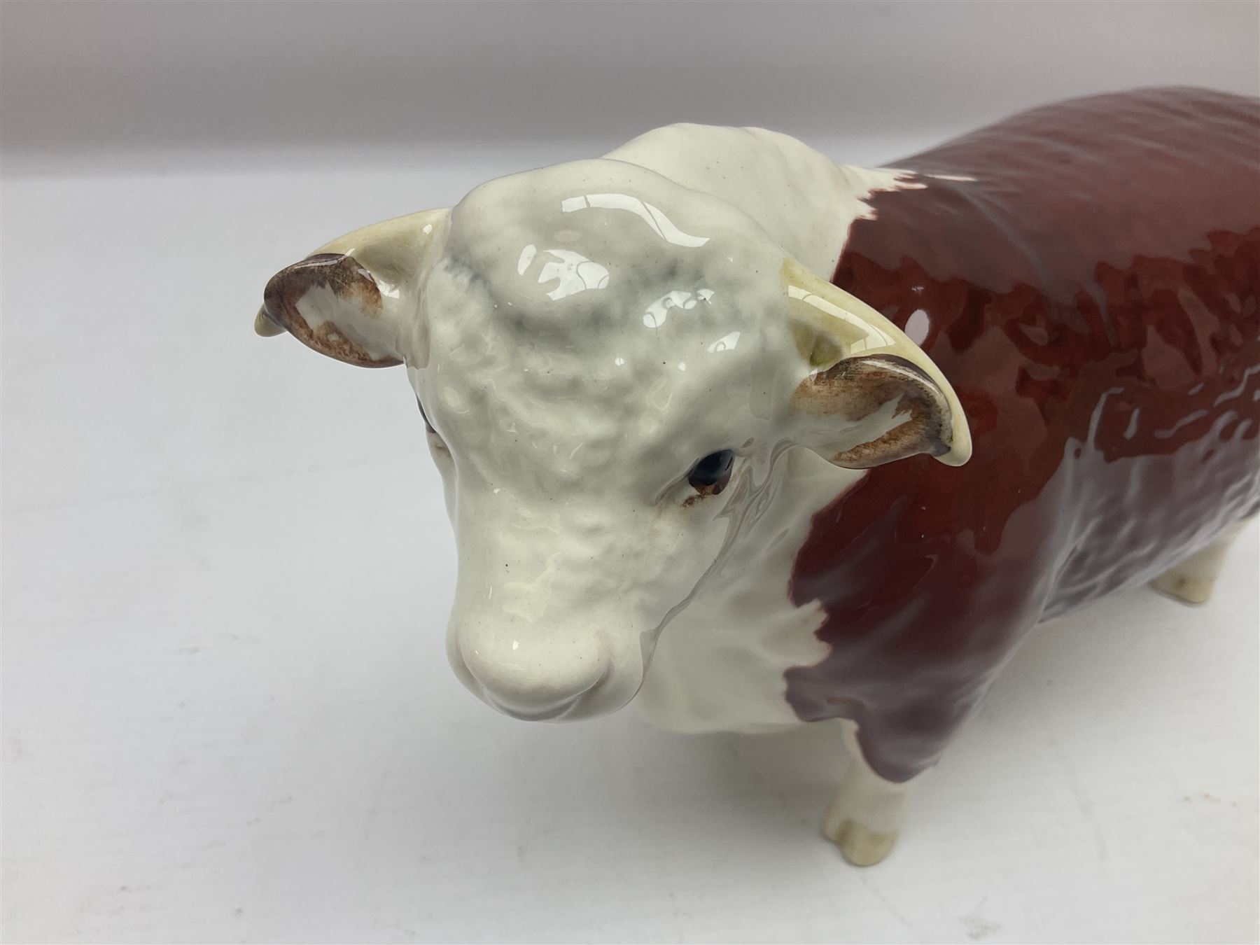 Beswick Hereford family group, comprising bull 1363, cow 1360, and calf 1406B