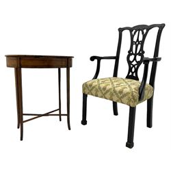 Edwardian satinwood and rosewood banded work table, oval form with hinged lid, on square supports with splayed feet connected by x-shaped stretchers (61cm x 39cm, H71cm); Georgian design black finish elbow chair (W60cm)