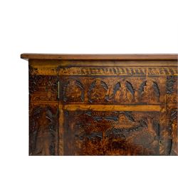 17th century and later cedarwood and pine side cupboard, moulded rectangular top, enclosed by two doors possibly removed and reused from a Venetian Cassone, carved and decorated with penwork, the upper architectural arcade with busts of noblemen, the larger decoration depicting hunters on horseback within woodland landscape with various animals, central and flanking uprights decorated with classical female figures upon pedestals, lower roundels decorated with lion and putto motifs, overall foliate decoration, raised on five hairy paw carved feet, the interior fitted with shelf