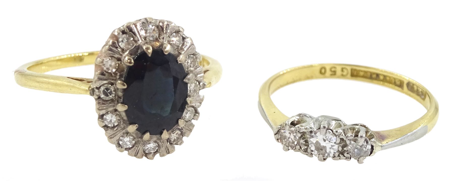 Early 20th century 18ct gold three stone old cut diamond ring and a later 18ct gold sapphire and single cut diamond cluster ring, both stamped