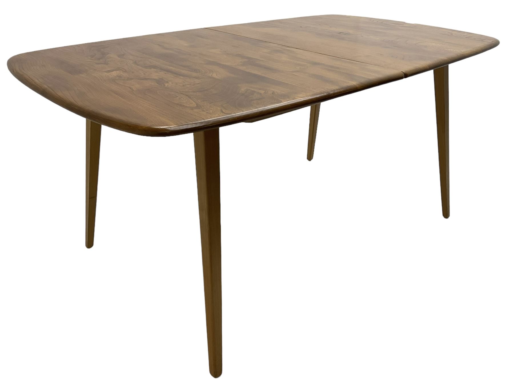 Ercol - light elm and beech 'Slide Leg Expanding Dining Table (444)', rectangular top with rounded corners, raised on tapered splayed supports, with two additional leaves