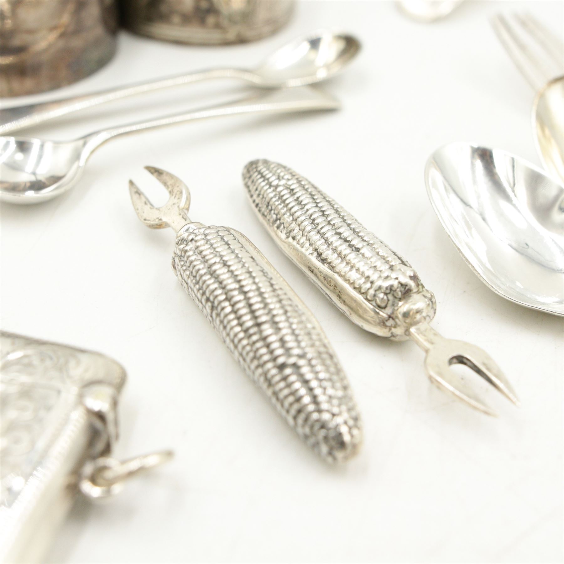 Pair of Victorian silver dessert spoons London 1856, silver vesta case Birmingham 1899, three silver serviette rings, various tea spoons etc