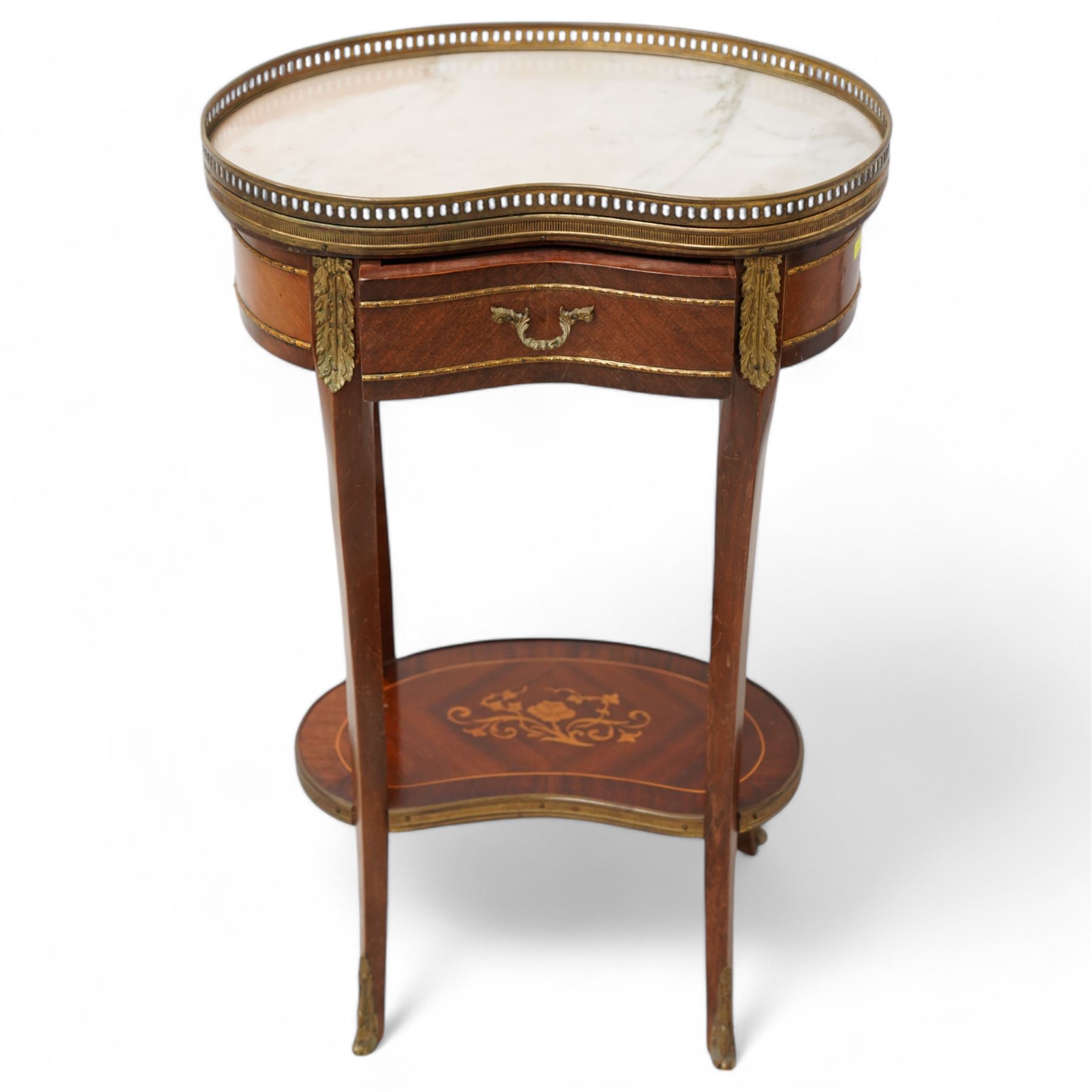 Early 20th century French walnut kidney-shaped occasional table, white marble top with raised pierced brass gallery, fitted with single frieze drawer, flanked by acanthus shaped gilt metal mounts, raised on cabriole supports united by a floral inlaid under-tier