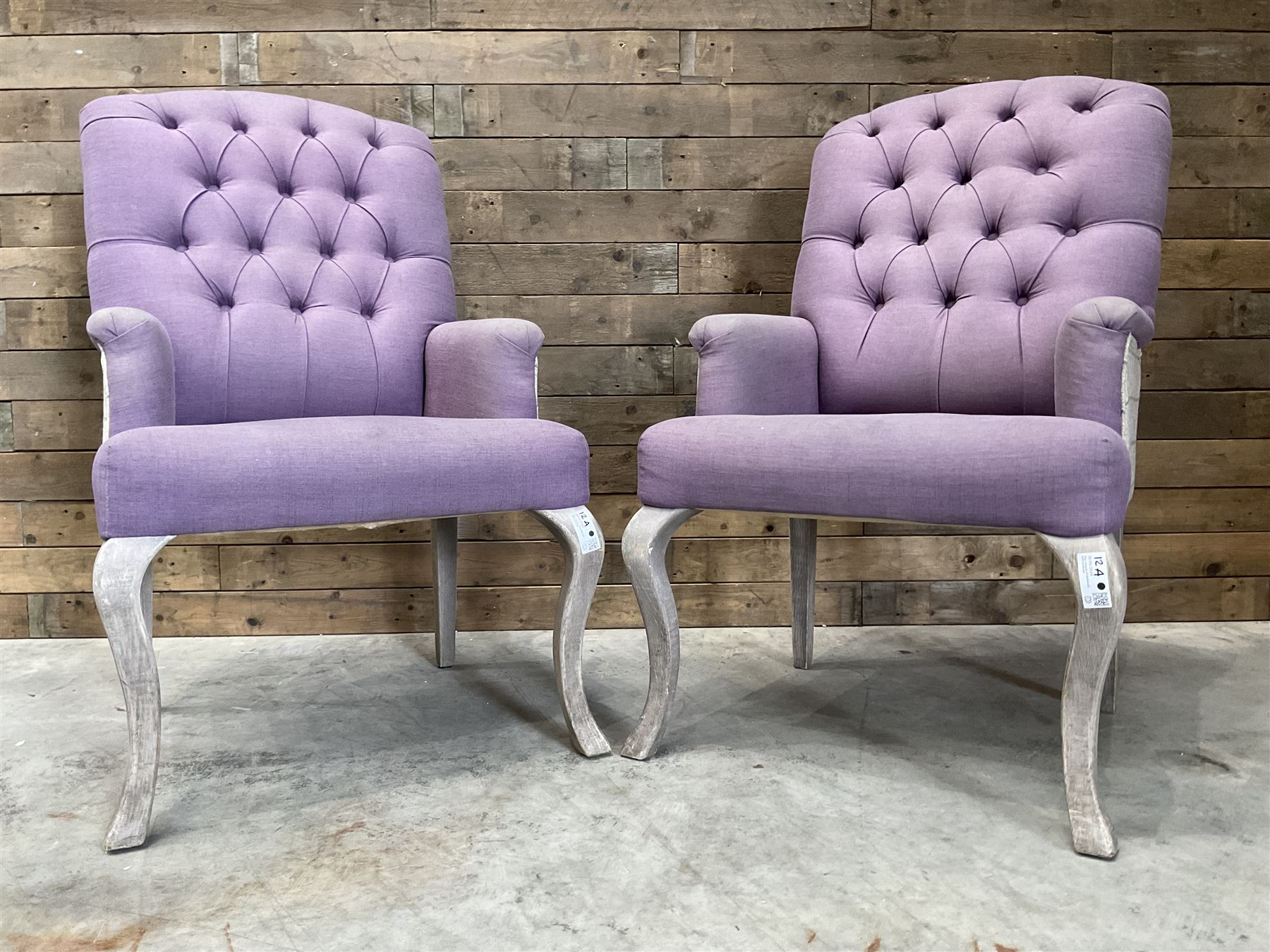 Voyage - two high back armchairs upholstered in buttoned lilac and tweed fabric, painted cabriole legs