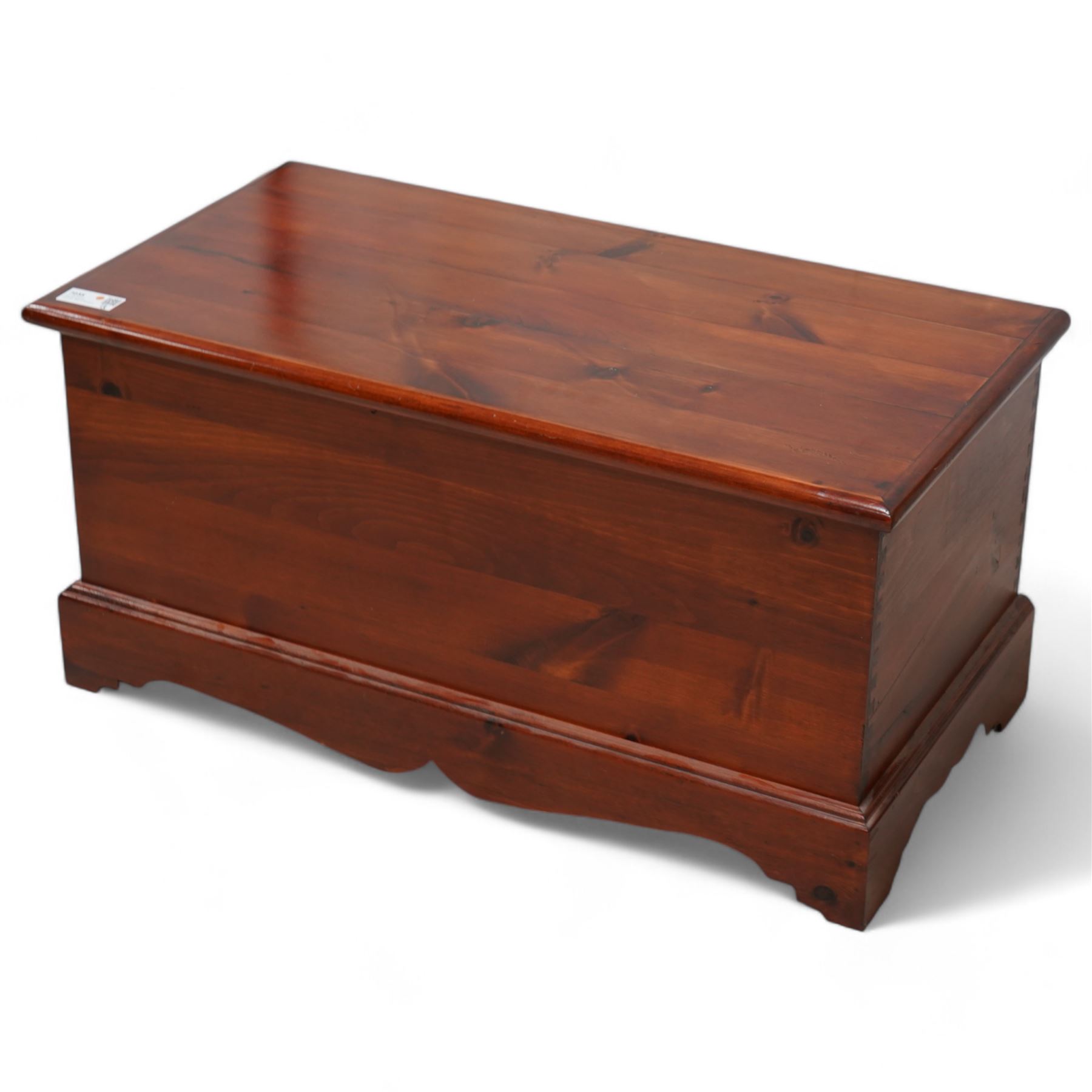 Stained pine blanket box, enclosed by hinged lid, moulded plinth base 