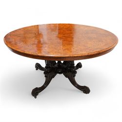 James Shoolbred & Co. (London: 1814-1934) - Victorian figured walnut loo table, oval mould...