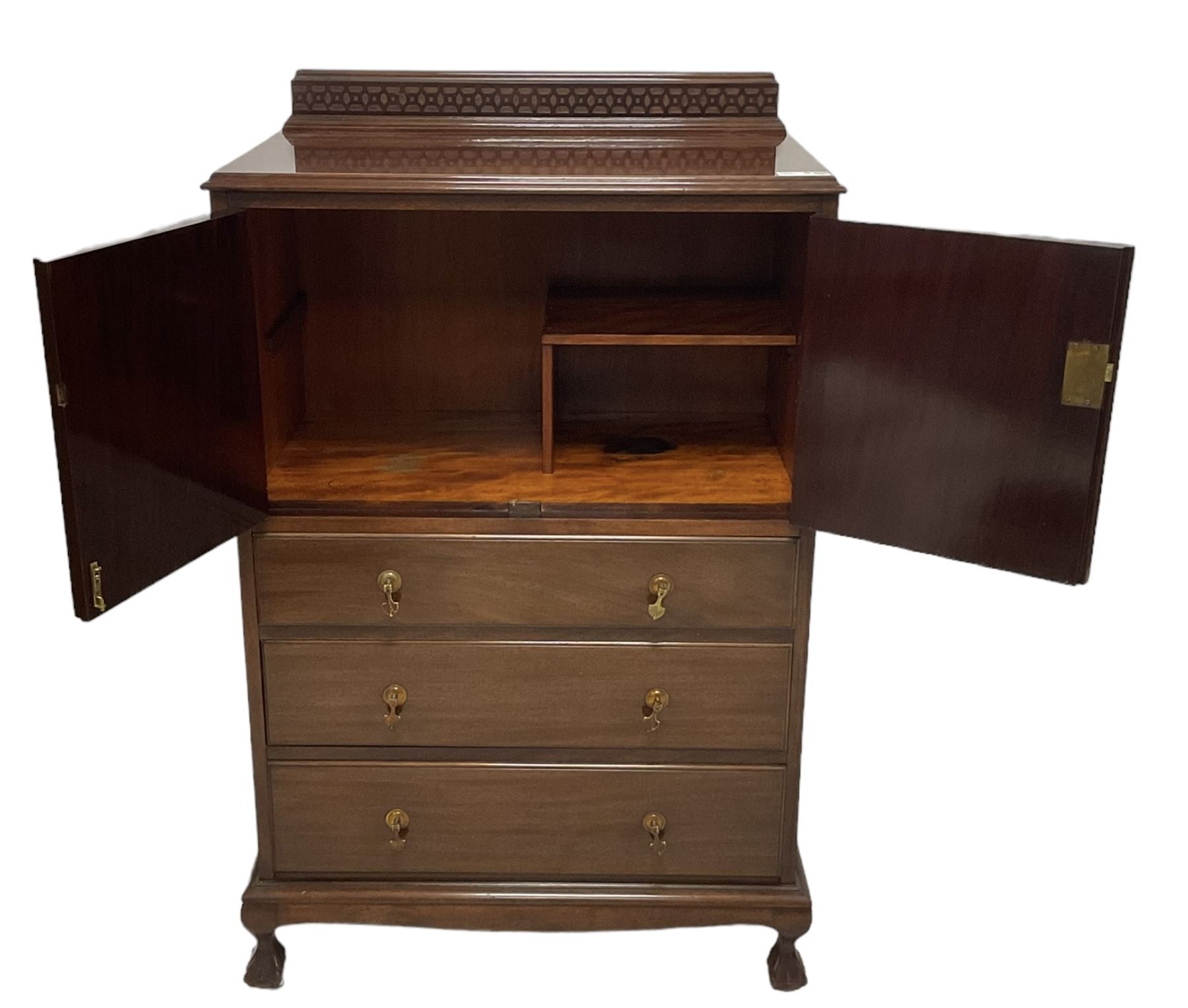 Early 20th century mahogany tallboy, double cupboard over three drawers, on ball and claw carved cabriole feet