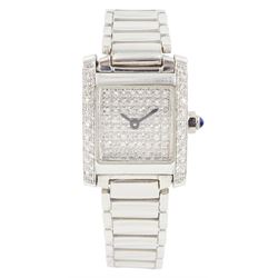 Tresor Paris ladies 9ct white gold diamond quartz wristwatch, pave set round brilliant cut diamond dial and diamond set case, London 2003, on integral 9ct white gold bracelet, with fold-over clasp, stamped 375