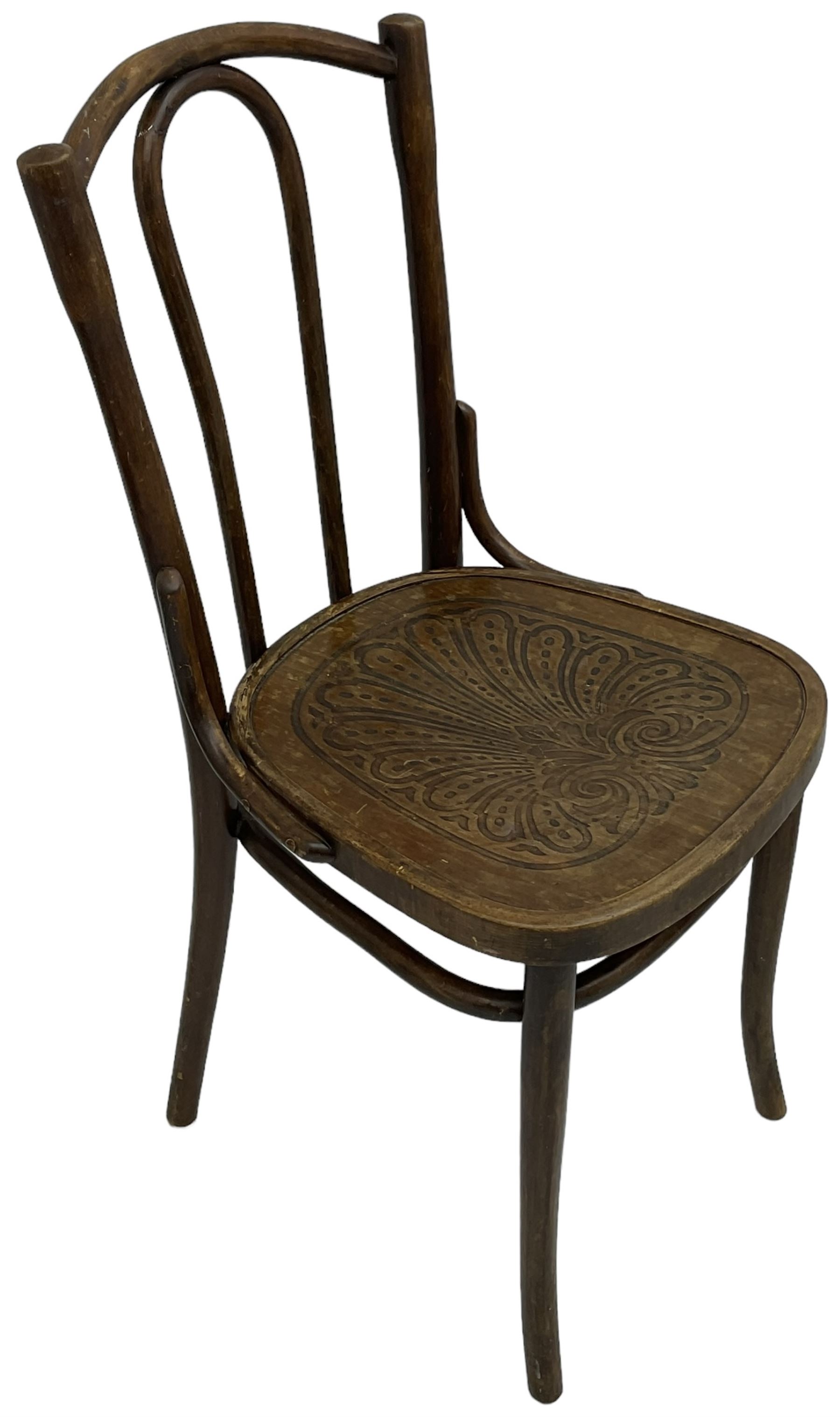 Set of three late 19th to early 20th century century bentwood dining chairs, the seats with pressed anthemion decoration, circa. 1900s