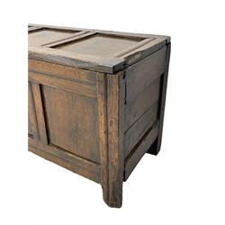 17th century panelled oak blanket chest or kist, quadruple panelled hinged lid over quadruple panelled front, moulded frame and pegged construction, on stile supports