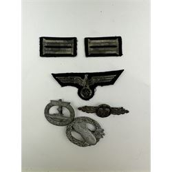 Post war copies of WWII German badges, including Third Reich Luftwaffe fighter clasp, Waffen SS- Balloon observer badge and Kriegsmarine U-Boat badge, together with five cloth badges