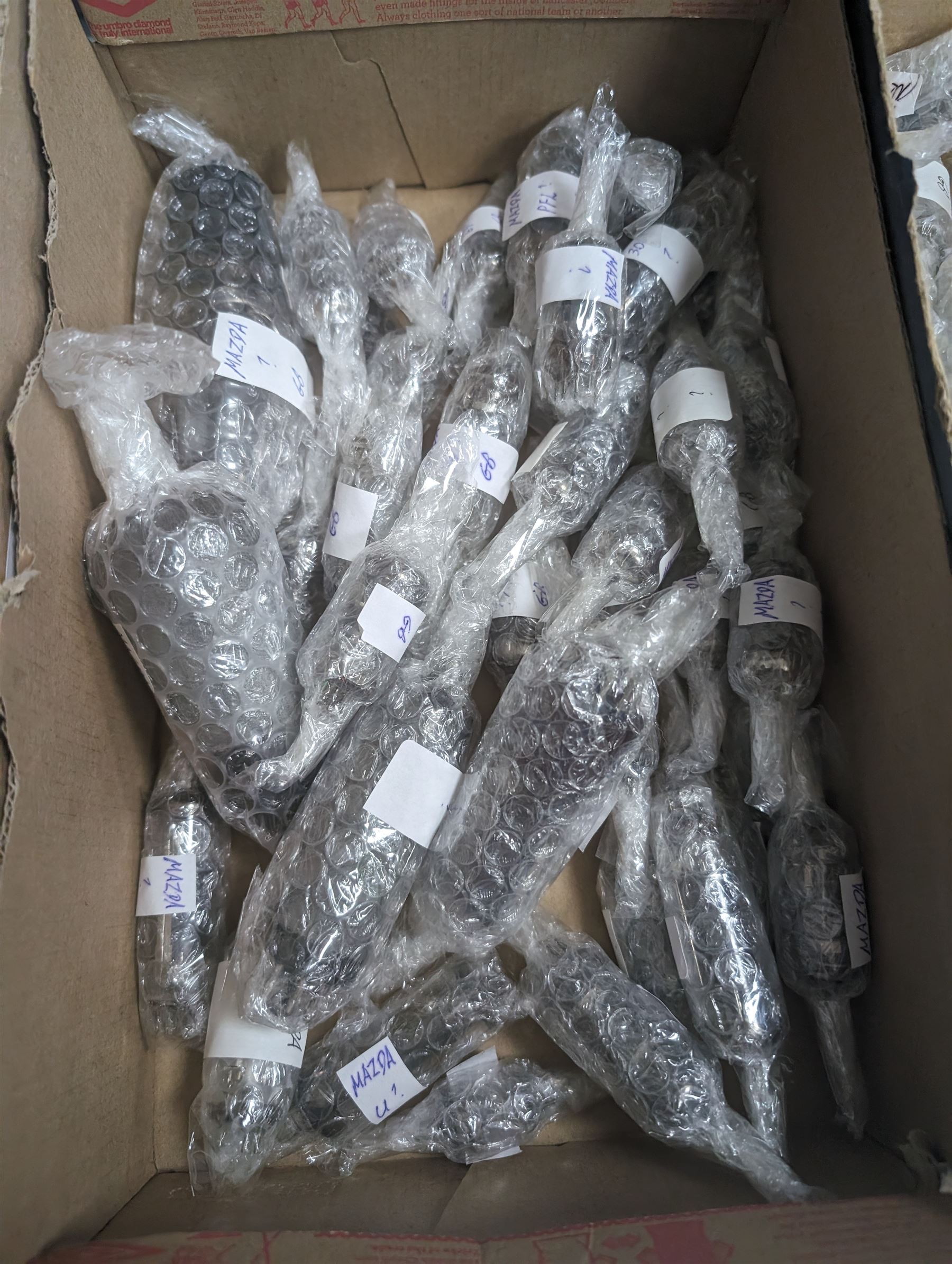 Large collection of Mazda thermionic radio valves/vacuum tubes, including boxed examples and loose bubble wrapped and identified examples