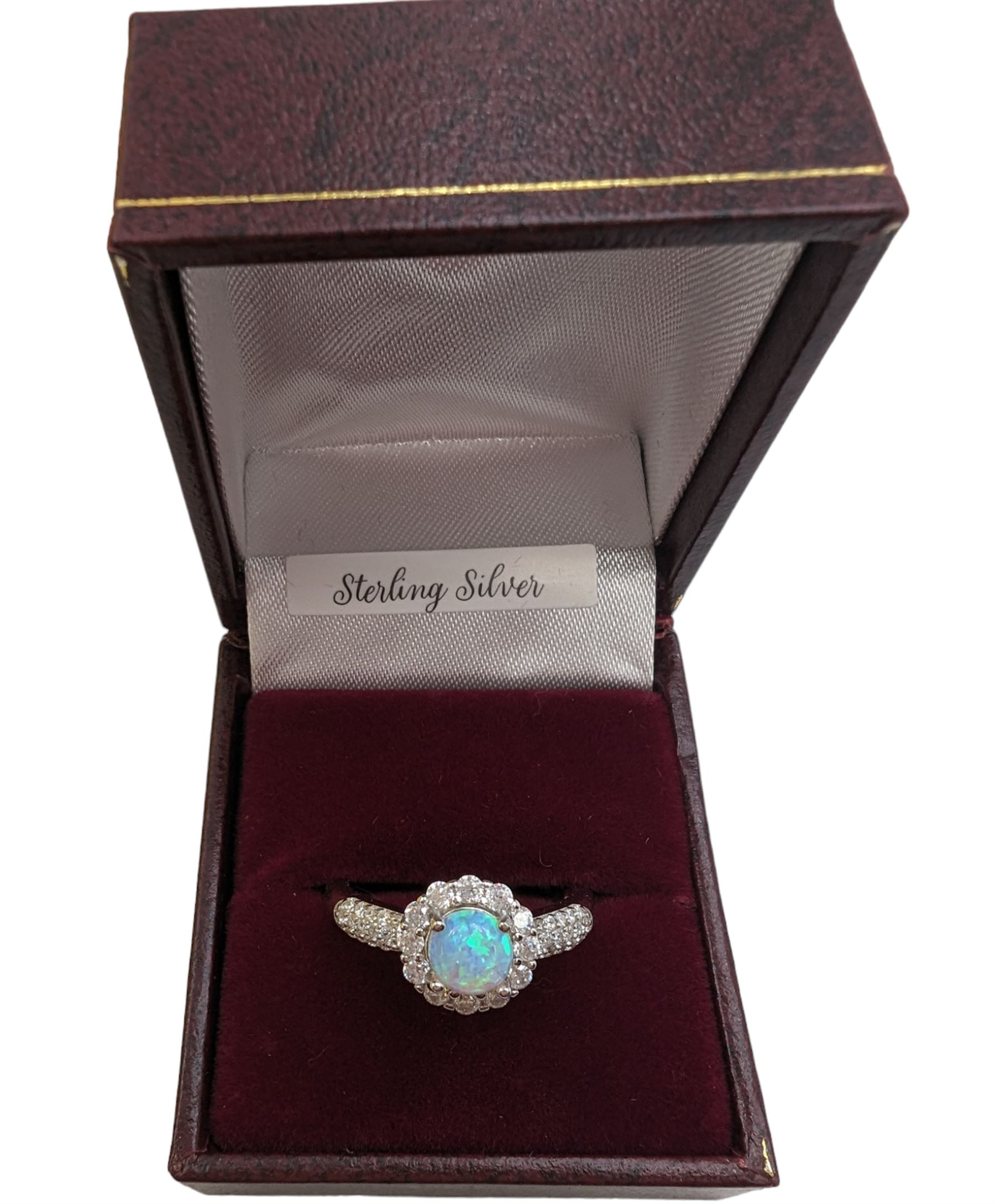 Silver opal and cubic zirconia cluster ring, stamped 925, boxed