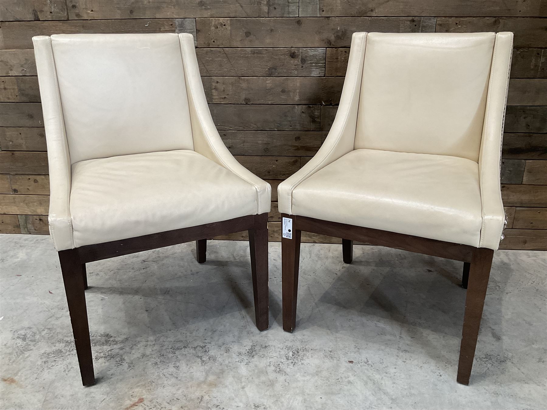 28 x walnut framed dining chairs, upholstered in beige leather