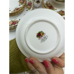 Royal Albert Old Country Roses pattern dinner service for six place settings, comprising dinner plates, side plates, dessert plates, two sets of bowls, small plates and salt and pepper shakers, all with printed marks beneath 