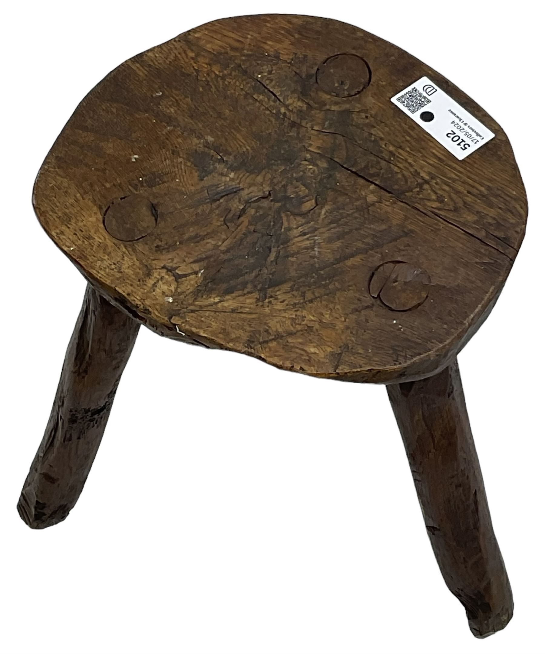 Rustic oak three-legged stool