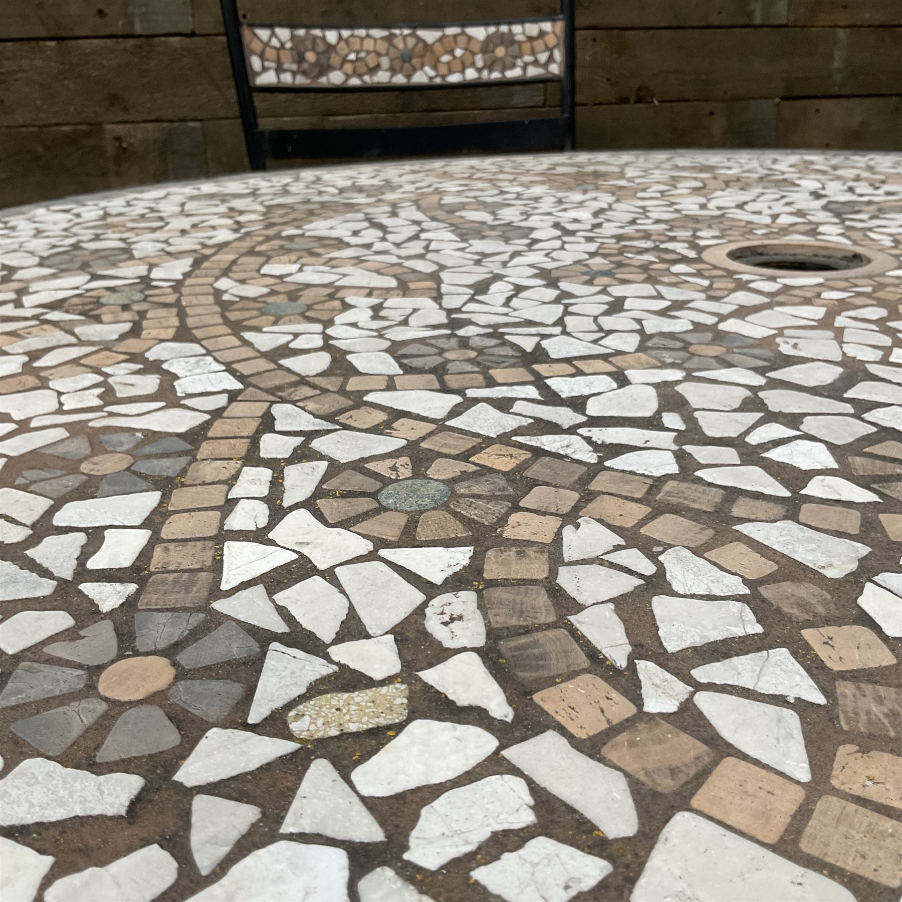 Mosaic and black metal circular garden table and four chairs - THIS LOT IS TO BE COLLECTED BY APPOINTMENT FROM DUGGLEBY STORAGE, GREAT HILL, EASTFIELD, SCARBOROUGH, YO11 3TX