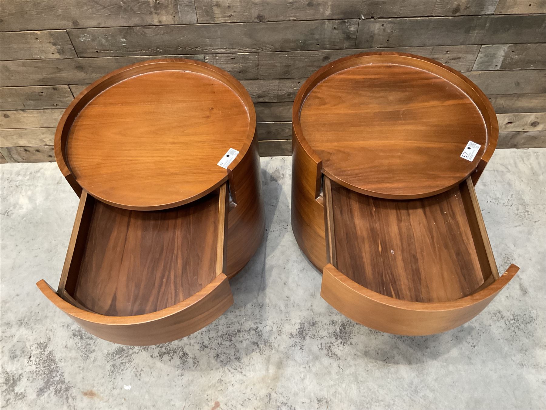 Pair of walnut circular barrel shaped lamp tables, fitted with single drawer