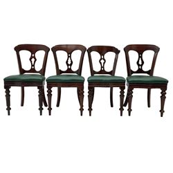 Matched set of twelve Victorian mahogany dining or boardroom chairs, the shaped cresting rail decorated with scrolled decoration, upholstered drop-on seats upholstered in green fabric, on turned supports  