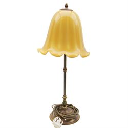 Brass table lamp, with knopped stem upon a stepped circular foot, with opaque yellow/orange fluted glass shade, including shade H60cm