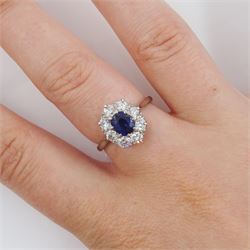 Platinum oval cut sapphire and transitional cut diamond cluster ring, stamped Plat, sapphire approx 0.70 carat, total diamond weight approx 0.80 carat