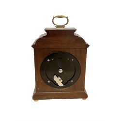 Elliott mantle clock in an 18th century bracket clock style case.