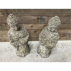 Pair of cast stone garden Buddahs