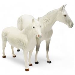 Group of Beswick horses and donkeys, including Connemara pony, a grey gloss stallion and foal, Black Beauty, another foal, two shire horses and two donkeys 