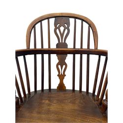 19th century yew wood and elm Windsor armchair, low double hoop stick and pierced splat back, dished seat on turned supports united by crinoline stretchers