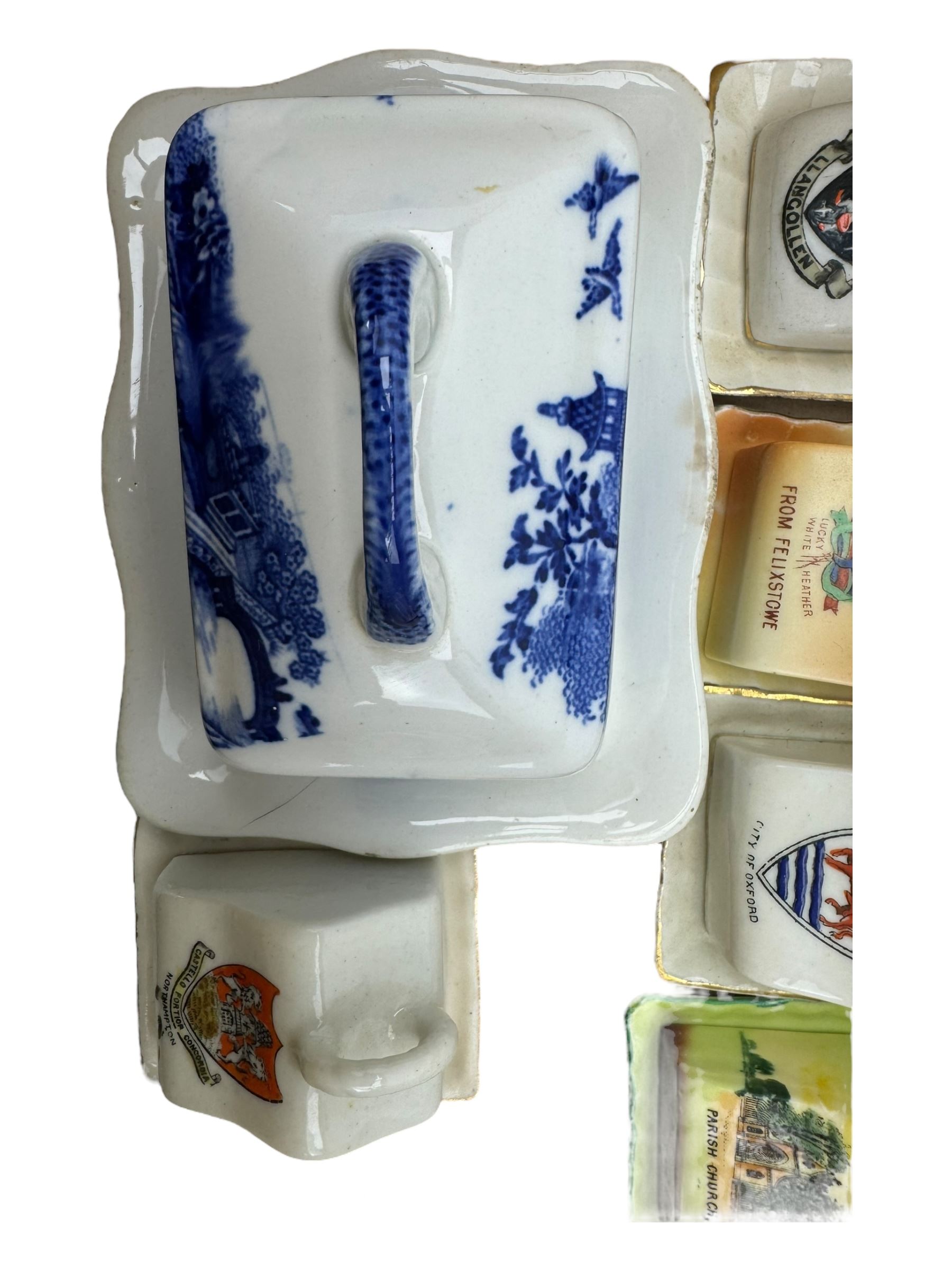 Collection of crested ware miniature cheese dishes and covers, including one by Goss, in one box