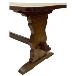 Gnomeman - oak dining table, rectangular adzed top, shaped end supports on sledge feet united by pegged stretcher, by Thomas Whittaker, Littlebeck, Whitby 