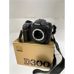 Nikon D300 camera body serial no. 4105777, boxed with shoulder strap, instructions, charger, etc