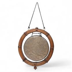 Late 19th to early 20th century oak framed hanging gong, the metal gong in circular oak frame with stop chamfered edges 