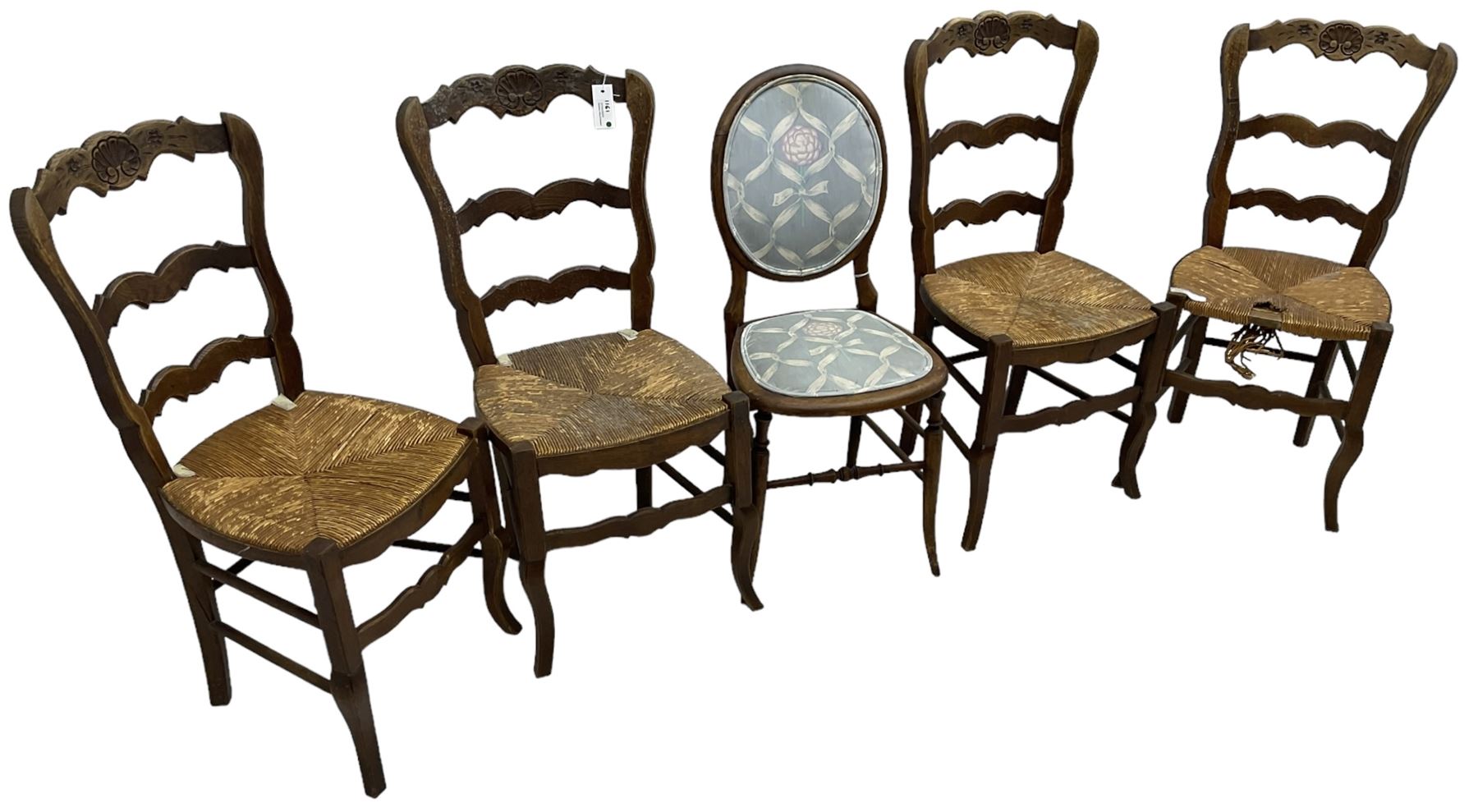 Set of four French hardwood dining chairs, the shaped cresting rail varved with shell, rush seat, on cabriole supports; Victorian beech cameo back chair 