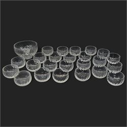 Dartington Ripple pattern fruit set comprising thirty bowls and serving bowl and a number of plain glass champagne saucers