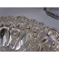 Edwardian silver pedestal bowl, of circular form, with shaped C scroll rim, embossed with floral and foliate decoration throughout, upon a circular foot, hallmarked Elkington & Co Ltd, Birmingham 1901, H9.5cm, D25cm