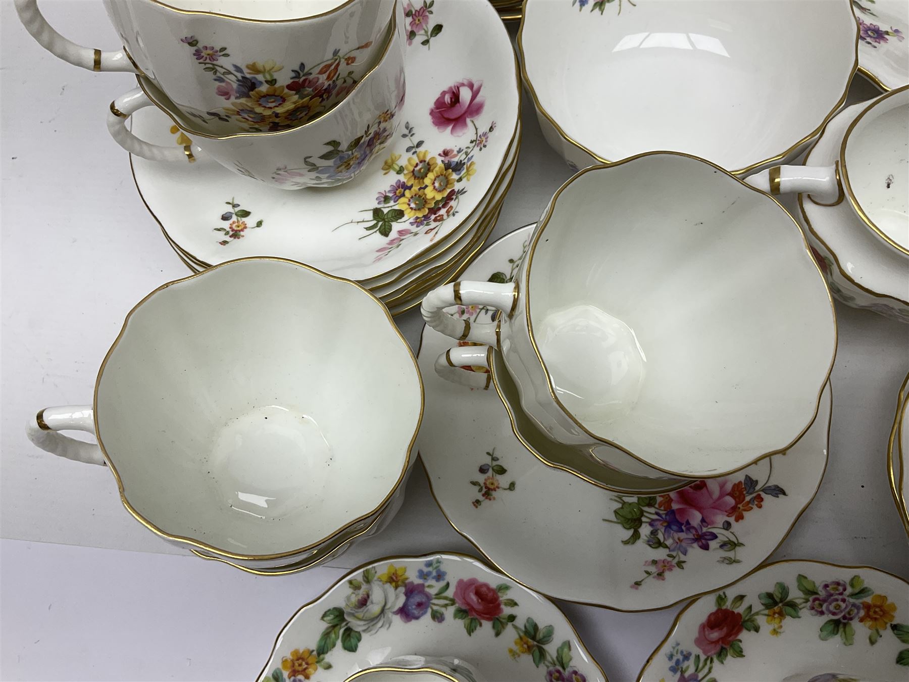 Royal Crown Derby Posies pattern tea service, including two milk jugs, two open sucrier, twelve teacups and saucers, twelve dessert plates etc 