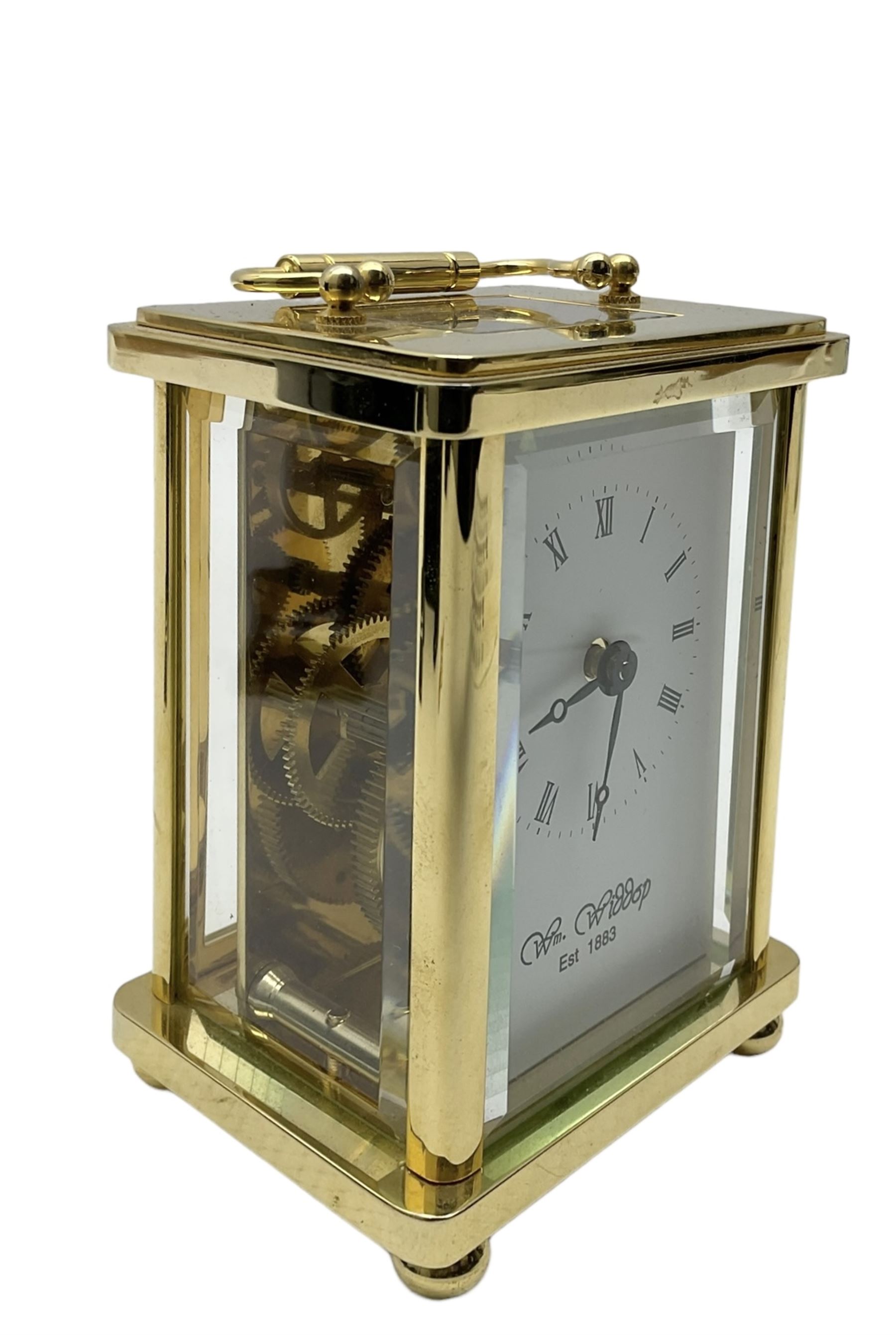 William Widdop - 20th century 8-day  brass cased carriage clock with an enamel dial, Roman numerals, minute track and steel moon hands, single train timepiece movement with a lever platform escapement, housed in a bespoke leather case, with key. 