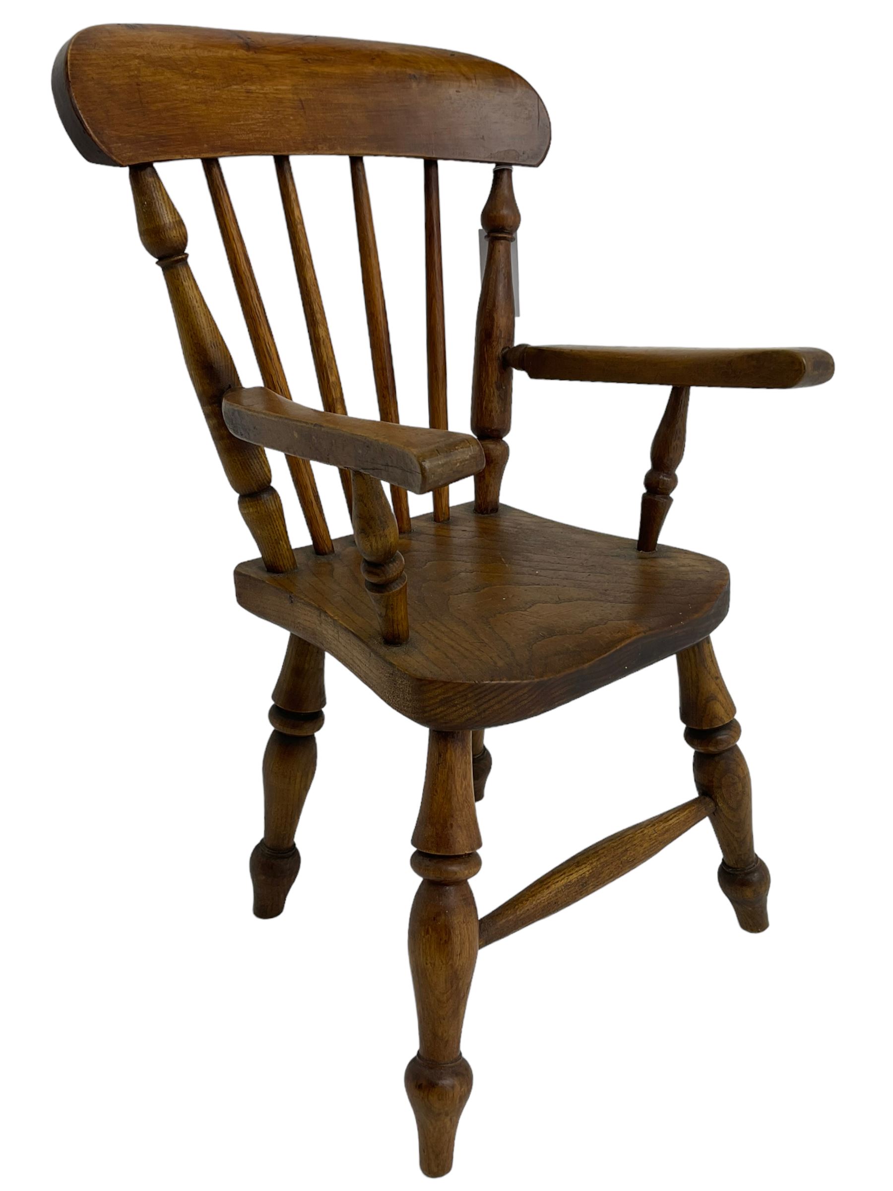 19th century elm and beech child's farmhouse chair, shaped cresting rail over stick back, on turned supports 