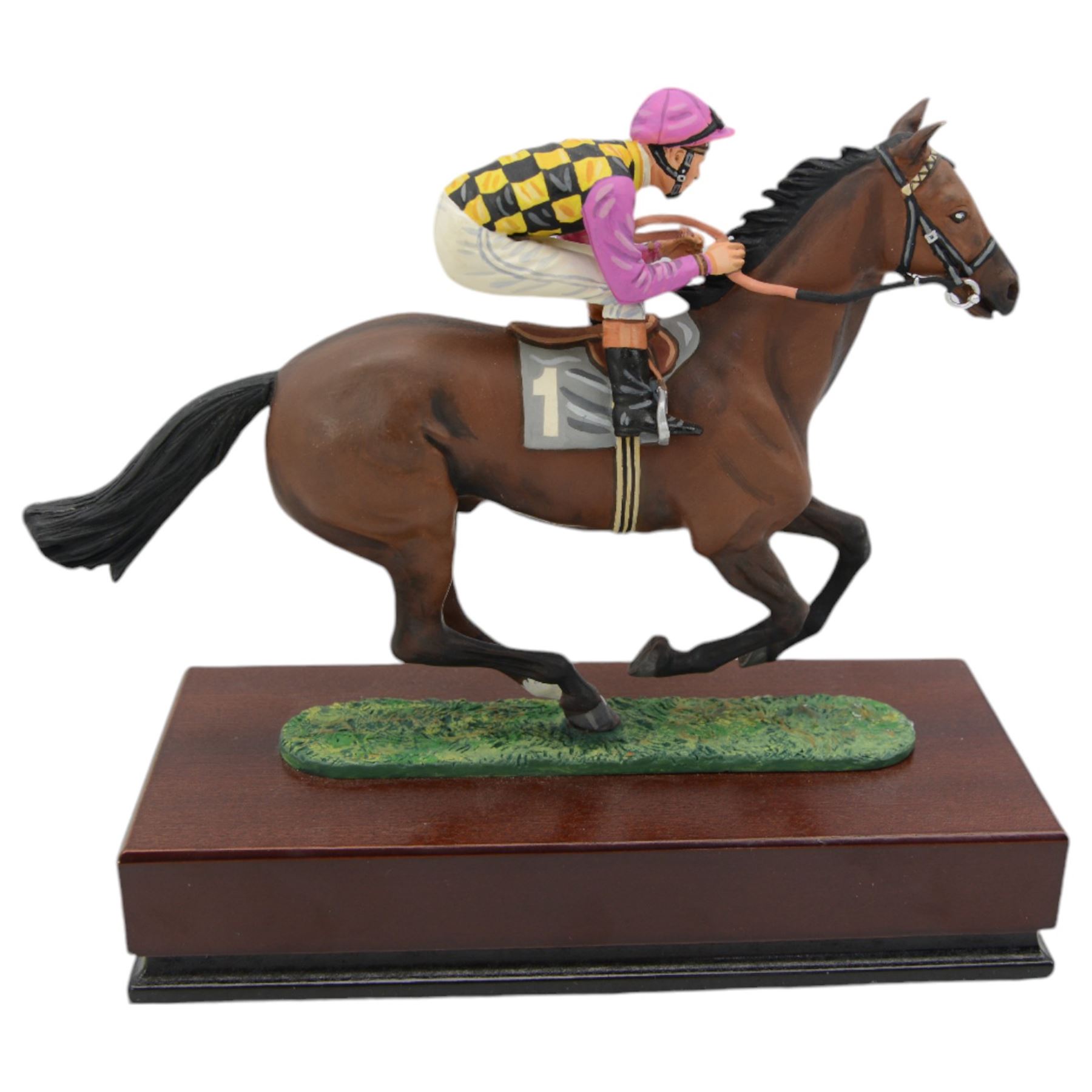 'The Hearthstead Homes Stakes York 1996 won by Mr Guy Reed's 'Give me a Ring' - Limited edition cold painted bronze by Cameron Sculptures of a racehorse with jockey up in Guy Reed's racing colours 20cm x 22cm