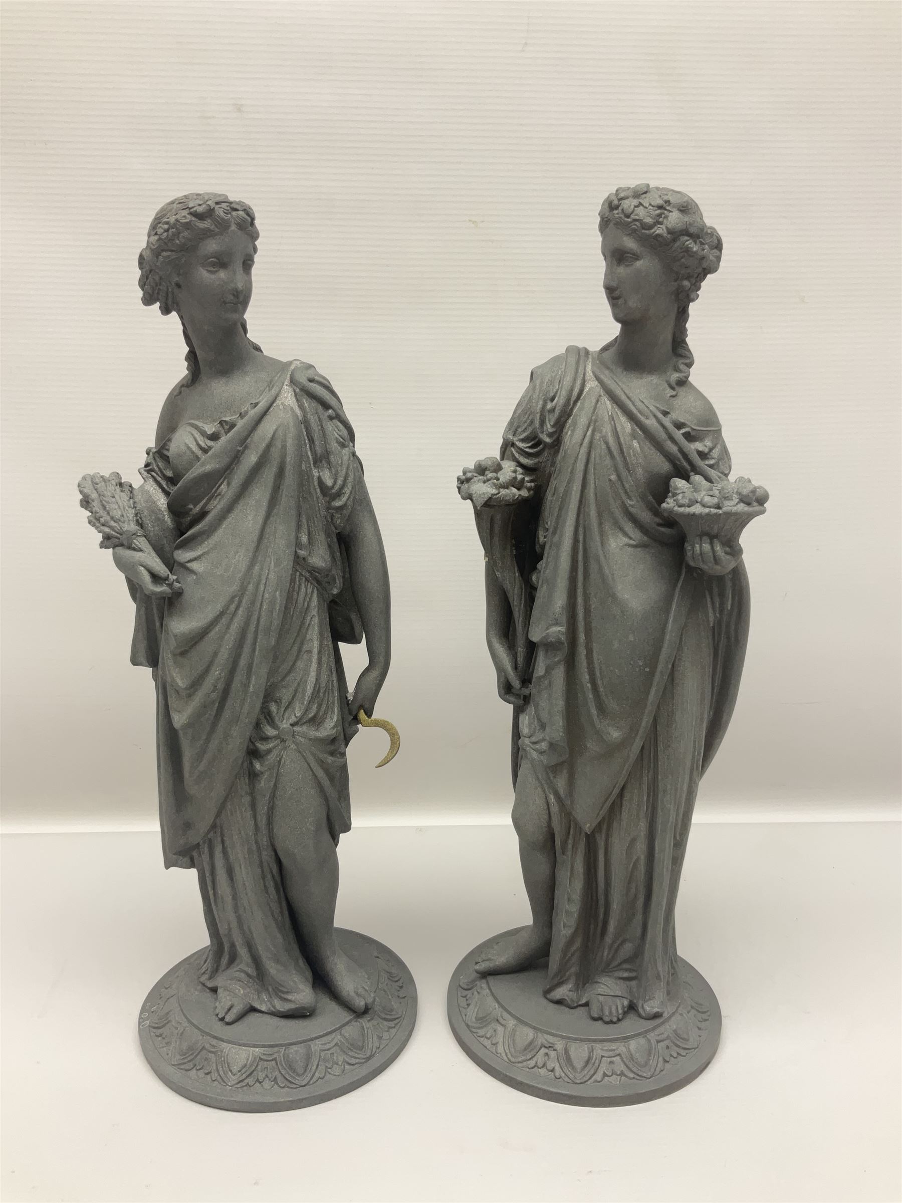 Four spelter figures of women in neoclassical dress, largest H47cm