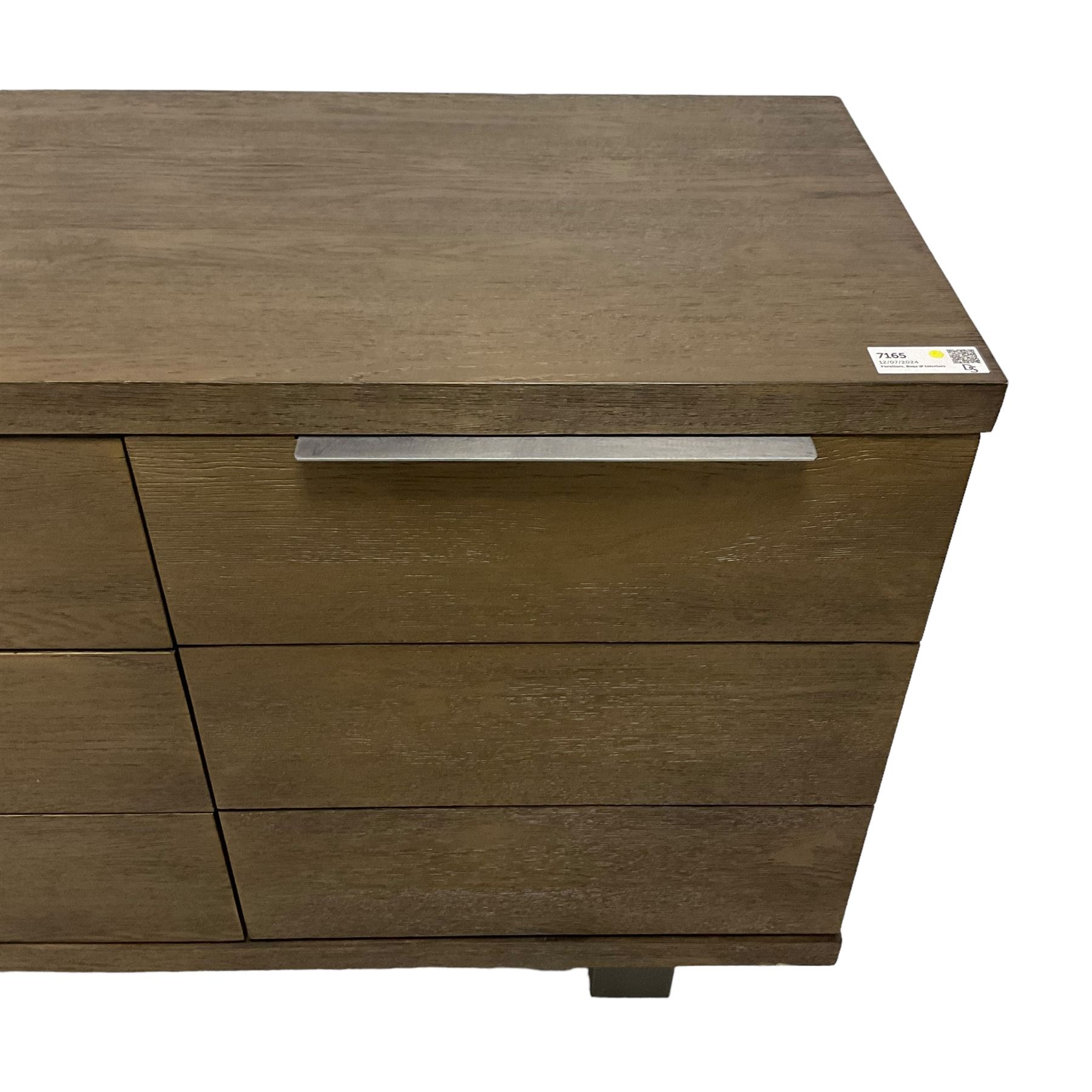 Contemporary dark oak finish sideboard, three central drawers flanked by single cupboards, on angular black finish metal supports 