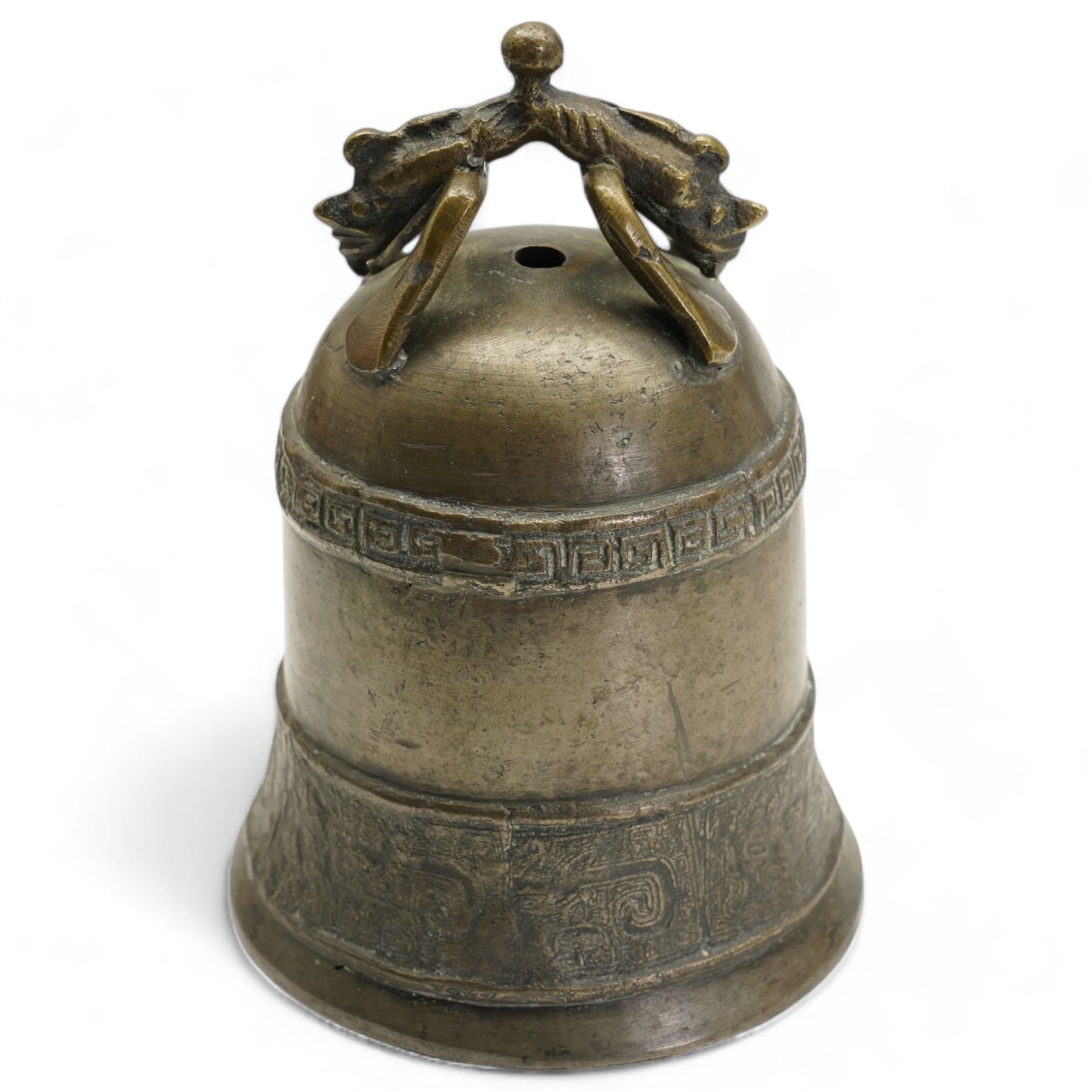 Chinese bronze bell with mythological animal handle H15cm, Eastern turquoise flask with applied floral decoration, Chinese carved hardwood figure of a Deity holding a Lotus flower H37cm and an ormolu candlestick 