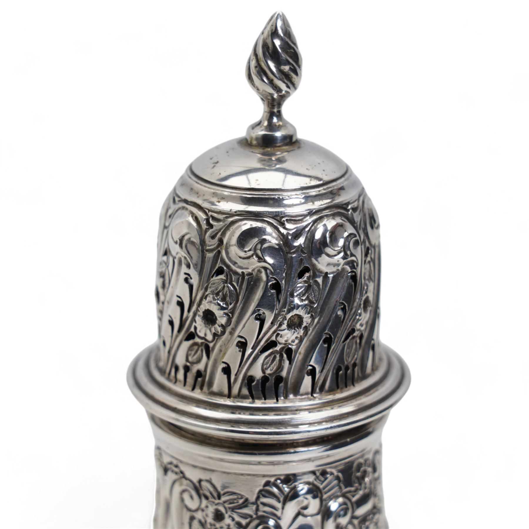 Edwardian embossed silver caster decorated with flowers, foliage etc H16cm Chester 1905 Maker George Nathan & Ridley Hayes